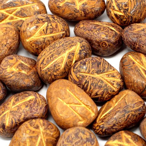 Discover the powerful energy of the Snake Jasper Runes Stone Set, perfect for divination, meditation, and spiritual guidance. This set includes 25 hand-crafted semi-precious stones — 24 etched with traditional rune symbols and one blank stone for personal intentions. Snake Jasper is known for its grounding and protective properties, helping to balance energy, enhance intuition, and promote emotional healing. Each rune stone acts as a spiritual tool to unlock insight and connect with your inner wisdom. Store