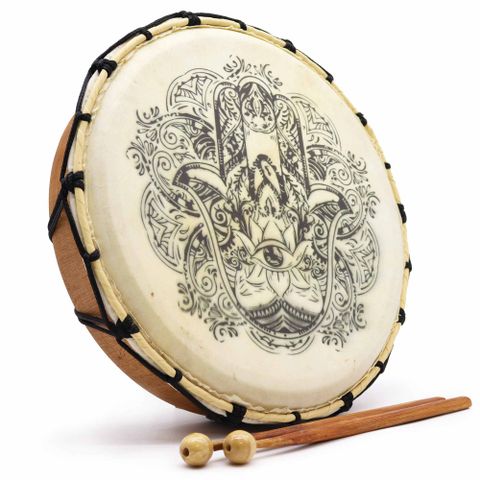 Channel the sacred energy of rhythm and protection with our 30cm Hamsa Shamanic Drum. Handcrafted from premium Suar wood and covered with authentic goat skin, this mystical drum is as visually captivating as it is spiritually empowering.

The drum features the Hamsa symbol, a revered emblem across cultures, known for its protective qualities and ability to ward off negative energy. Ideal for shamanic journeying, ritual work, sound healing, or sacred music, this drum brings depth and power to any spiritual p