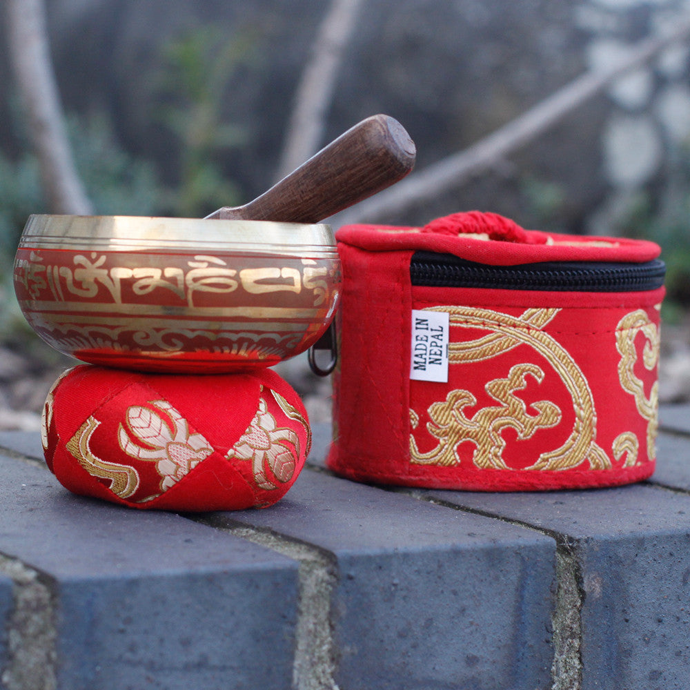 This Mini Singing Bowl Gift Set in red is the perfect offering for those seeking harmony, focus, and inner calm. Handmade in Nepal by skilled artisan craftspeople, each bowl is carefully crafted to carry the traditional resonance of the Himalayas.

The set comes with a wooden striker and a beautiful pouch bag, making it an ideal gift of peace and mindfulness. Use the wooden end of the striker to make the bowl sing, producing a steady base tone of A3 with gently shifting wave sounds that bring balance to med