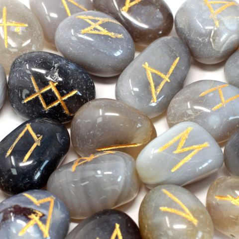 Shop Grey Agate Runes Set with 25 stones for divination and protection. Enhance intuition and balance energy with The Witches Garden’s unique rune stones.