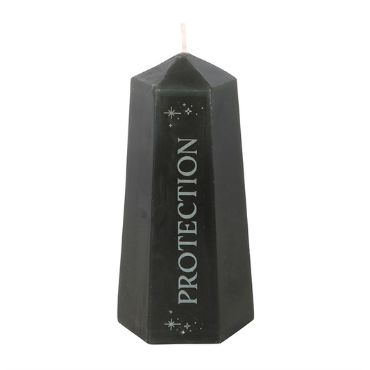 Repell unwanted energies and promote inner clarity with this Protection Crystal Candle. Shaped like a black crystal tower, this candle offers up to 30 hours of burn time to gradually reveal a rough obsidian stone hidden at the bottom. Perfect for setting intentions and manifesting your dreams, it's the ideal accessory to complement your sacred space. Unscented paraffin wax. Burn on a protected surface.