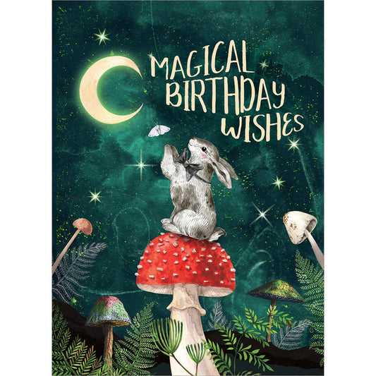 Send a whisper of woodland magic with this Tree-Free Magical Birthday Wishes Card, featuring a gentle rabbit perched upon a toadstool beneath a glowing crescent moon. Surrounded by forest mushrooms and starlit skies, this enchanting design captures the spirit of nature, wonder, and quiet birthday blessings. Printed on 100% post-consumer recycled, tree-free paper, it’s a mindful choice for magical gifting. Complete with an illustrated envelope and delicate inner artwork, this card is perfect for those who wa