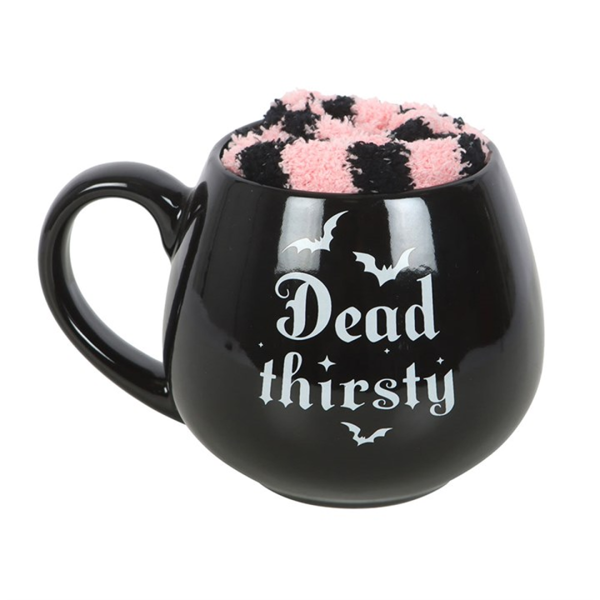 Stay cosy and delightfully dark with the Dead Thirsty Mug &amp; Socks Gift Set, a playful pairing for those who like their tea hot and their humour a little twisted. Featuring a bold “Dead Thirsty” slogan and a striking pink and black gothic design, this set perfectly blends comfort with attitude.