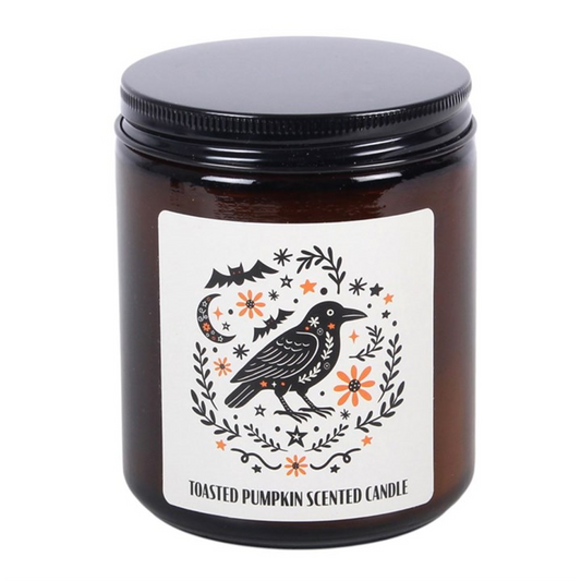 Add a warm and seasonal scent to the home with this toasted pumpkin fragranced glass candle, featuring a folk-inspired raven design in a classic brown apothecary-style jar with a screw top lid. Perfect for autumn evenings or as a thoughtful gift, it brings a cosy and inviting feel to any space. Made from paraffin wax. Never leave a lit candle unattended.