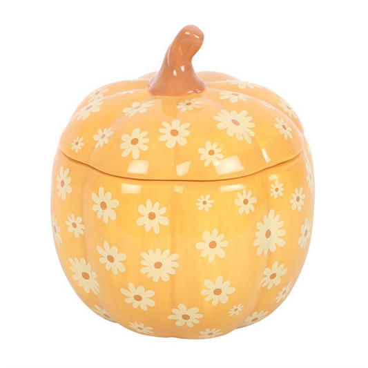 Summon the warmth of autumn into your home with this Groovy Floral Pumpkin Oil Burner. Shaped as a radiant orange pumpkin and adorned with a playful floral pattern, it carries both seasonal charm and a touch of magical whimsy.

Perfect for filling your space with cosy fragrances, this burner blends function with festive spirit. Simply add fragrance oil diluted with water, remove the lid, and let the gentle flame release scents of comfort and enchantment.

Ideal for autumn rituals, Halloween gatherings, or s