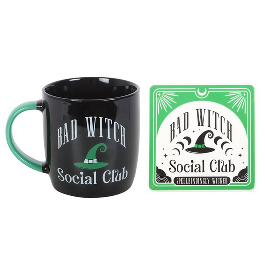 Sip in spellbinding style with the Bad Witch Social Club Mug & Coaster Set, a must-have for witches who like their mornings as magical as their mischief. Featuring a bold green witch hat design and matching coaster, this enchanting set brings playful charm to every brew.

With a 340ml capacity, this ceramic mug is perfectly sized for your morning potion, tea, or late-night elixir. Both microwave and dishwasher safe, it combines everyday practicality with a touch of gothic wit, making it as functional as it 