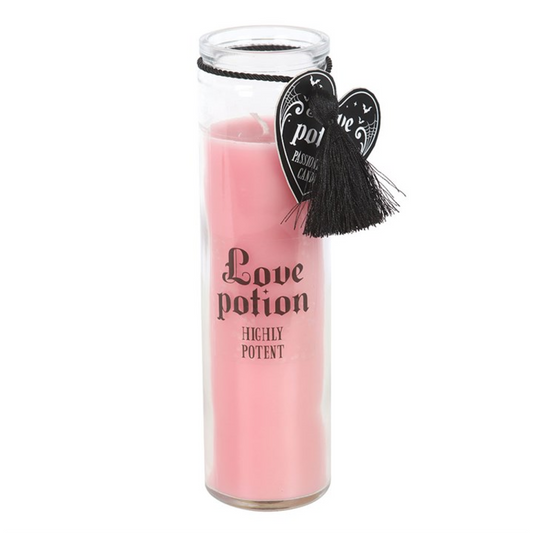 Ignite the magic of romance with this Love Potion Passionfruit Tube Candle. Encased in a sleek glass vessel, it releases a sweet, tropical passionfruit aroma that enchants the senses and sets a sensual, mystical atmosphere.

With an impressive approximate 70-hour burn time, this candle is perfect for long evenings, intimate rituals, or adding a touch of romantic gothic charm to your home. Beautifully presented, it makes a thoughtful gift for candle lovers, witchy souls, or anyone who delights in aromatic, s