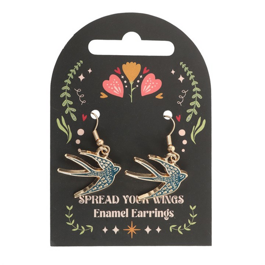 Blue swallow earrings symbolising freedom and transformation. Gothic folk jewellery inspired by flight, protection and independence.