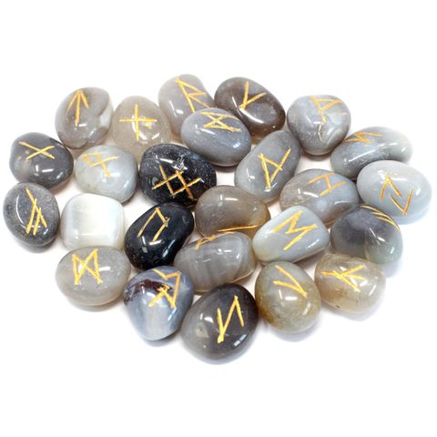 Discover the power of the Grey Agate Runes Set, featuring 25 smooth semi-precious stones—24 inscribed with authentic rune symbols and one blank stone for personalized intention setting. Crafted from calming grey agate, these runes promote mental clarity, emotional balance, and spiritual protection. Ideal for divination, meditation, and enhancing intuitive insights, this set helps you connect deeply with your inner wisdom and guides your path with confidence. Each rune set comes in a soft pouch for easy stor