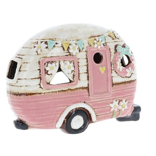 Decorative ceramic camper with floral and bunting design on a white background