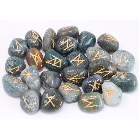 Discover the powerful energy of Moss Agate Runes, crafted from beautiful semi-precious stones known for their healing and grounding properties. This authentic Indian Rune Set includes 25 stones—24 engraved with traditional rune symbols and one blank stone for intuitive use. Each rune stone is carefully polished and stored in a soft pouch, perfect for carrying with you during meditation, divination, or spiritual rituals. Moss Agate is celebrated for enhancing emotional balance, attracting abundance, and stre