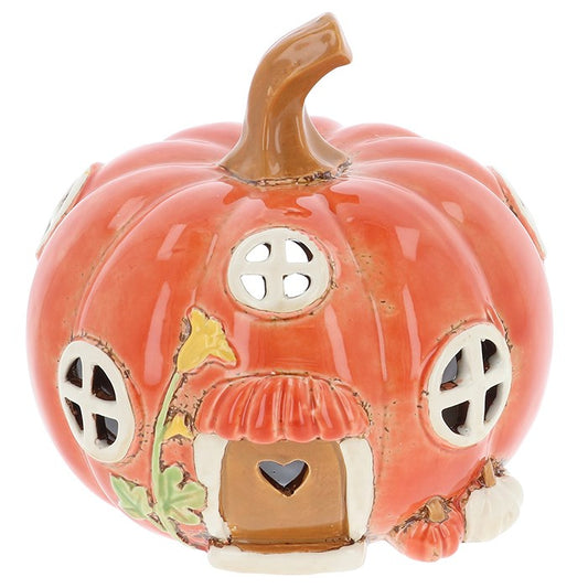 Village Pottery Pumpkin House Tealight – Shudehill | The Witches Garde…

Add storybook charm with the Village Pottery Pumpkin House Tealight. A magical Shudehill design, perfect for autumn, Halloween, or witchy home decor.