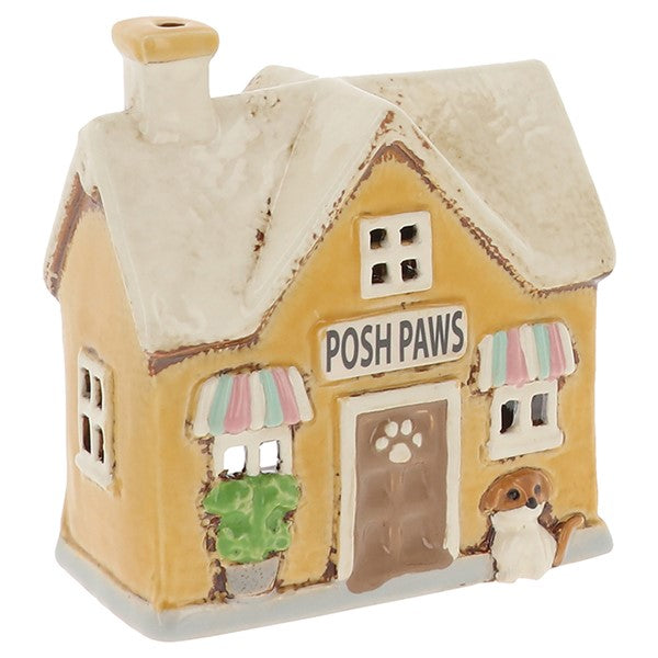 A gentle sanctuary for loyal companions and unseen familiars, Posh Paws glows with protective warmth. This Shudehill Village Pottery ceramic tealight house casts a comforting light, ideal for spaces of care, connection, and quiet guardianship. A piece that honours both earthly and spiritual bonds within your home.