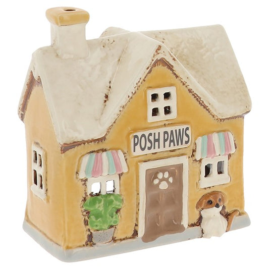 A gentle sanctuary for loyal companions and unseen familiars, Posh Paws glows with protective warmth. This Shudehill Village Pottery ceramic tealight house casts a comforting light, ideal for spaces of care, connection, and quiet guardianship. A piece that honours both earthly and spiritual bonds within your home.