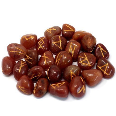 Unlock ancient symbols of divination with this hand-carved Red Aventurine Rune Stone Set.

This beautiful set contains 25 tumbled Red Aventurine crystals, each carefully engraved with a rune symbol—24 traditional runes and 1 blank stone for the unknowable.

Red Aventurine is a powerful stone of vitality, passion, and manifestation. It's known to:

Boost determination, confidence, and creativity

Encourage positive action and leadership

Support grounding while enhancing energy flow

Stimulate the root chakr
