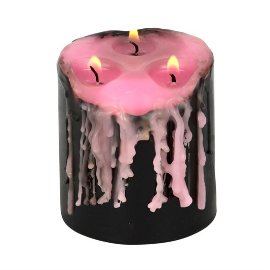 Embrace the dark romance of the gothic with this Small Pink Vampire Tears Pillar Candle. Unscented yet endlessly dramatic, it bleeds vivid pink wax as it burns, creating a mesmerizing, moody spectacle that transforms any room into a scene of shadowy enchantment.

Perfect for gothic interiors, candlelit rituals, or as a striking gift for lovers of dark aesthetics, this petite pillar brings a playful yet haunting flourish to your décor. With an approximate three-hour burn time, it’s ideal for intimate evening