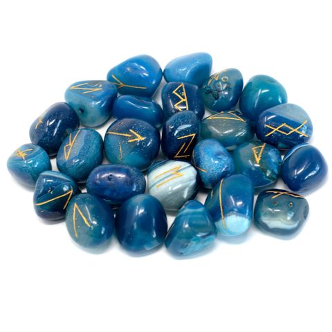 Unlock ancient runic wisdom with this enchanting Blue Onyx Rune Set. Each handcrafted set includes 25 polished stones: 24 engraved with traditional Elder Futhark runes and one blank stone, representing the unknowable.

Housed in a soft pouch for safekeeping, these rune stones are perfect for practitioners of divination, meditation, and spiritual reflection. Whether you're new to runes or an experienced reader, Blue Onyx enhances clarity and focus during readings.

Blue Onyx is known for its grounding energy