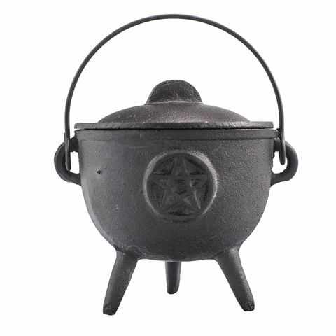 Our Cast Iron Cauldron with Pentagon 11x13cm embodies the spirit of magic and ancient symbolism. Designed for those devoted to rituals, spells, and mystical arts, this cauldron features a pentagram—a potent emblem representing earth, water, air, fire, and spirit. Crafted from premium cast iron, it offers lasting durability and naturally channels energy. Ideal for burning incense, herbs, or coals during ceremonies, its compact 11x13 cm size ensures ease of use. Embrace this powerful tool to deepen your magic