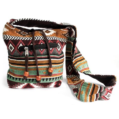 Crafted with soul and stitched with intention, the Mystic Nomad Jacquard Sling Bag in deep Chocolate tones is more than an accessory—it’s a companion for your spiritual journey. Inspired by ancient wanderers and woven with an ethnic jacquard fabric, this sacred carrier is perfect for those who walk between worlds, whether that's a city street or a forest path.

Lined with soft cotton and adorned with mindful details like secure zips and intuitive pockets, this bag supports you as you carry your essentials—a