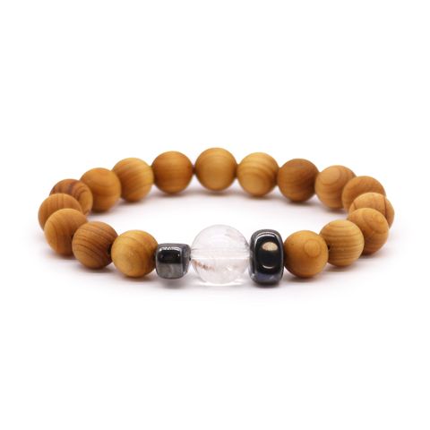 Discover the Cedarwood Crown Chakra Bangle with Clear Quartz, designed to enhance spiritual energy and mental clarity. The Clear Quartz stone amplifies your connection to higher realms, while the soothing cedarwood scent brings calm and insight. Perfect for meditation and spiritual growth, this bangle invites tranquility and enlightenment into your daily ritual. With a 7cm diameter and 1cm beads, it’s a meaningful gift for those seeking deeper self-awareness and mystical balance.