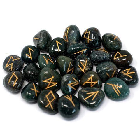 Bloodstone Runes nestled in a pouch, their origins shrouded in mystery. While their true beginnings remain uncertain, many believe these ancient symbols were first wielded between 2000 BC and 100 AD by tribes like the Goths and other Germanic peoples. Each set contains 25 stones: 24 etched with powerful runes and one left blank, ready to reveal your own destiny. Embrace the ancient magic and unlock the secrets of the past with this mystical collection.