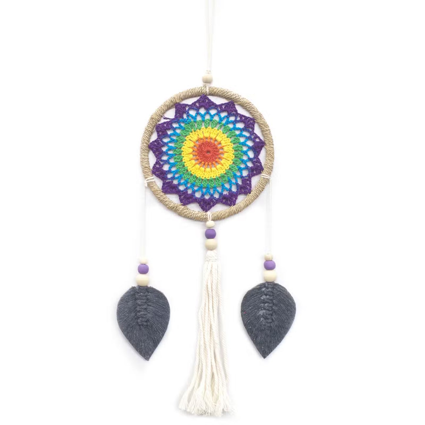 This Rainbow Spirit Dream Catcher carries the colors of the rising sun and the promise of harmony. Each vibrant strand weaves together the blessings of joy, positivity, and balance. Traditionally, the dream catcher is a sacred object of protection, a gift from the Spirit of the Night. Good dreams are guided gently through the web, while the bad become lost in its threads and fade away with the dawn.

This piece is handmade on the blessed island of Bali, where the people honor the spirit world and renew the 