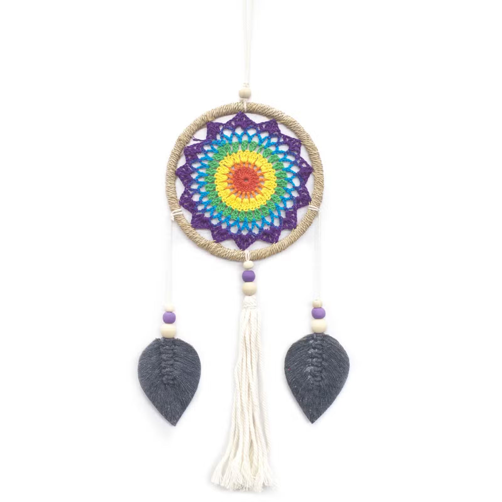 This Rainbow Spirit Dream Catcher carries the colors of the rising sun and the promise of harmony. Each vibrant strand weaves together the blessings of joy, positivity, and balance. Traditionally, the dream catcher is a sacred object of protection, a gift from the Spirit of the Night. Good dreams are guided gently through the web, while the bad become lost in its threads and fade away with the dawn.

This piece is handmade on the blessed island of Bali, where the people honor the spirit world and renew the 
