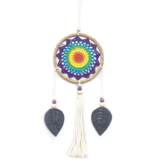 This Rainbow Spirit Dream Catcher carries the colors of the rising sun and the promise of harmony. Each vibrant strand weaves together the blessings of joy, positivity, and balance. Traditionally, the dream catcher is a sacred object of protection, a gift from the Spirit of the Night. Good dreams are guided gently through the web, while the bad become lost in its threads and fade away with the dawn.

This piece is handmade on the blessed island of Bali, where the people honor the spirit world and renew the 