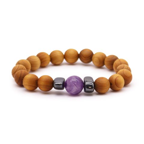 Discover the Cedarwood Third Eye Chakra Bangle with Amethyst, designed to enhance intuition and spiritual clarity. The Amethyst stone activates the Third Eye Chakra, guiding you toward deeper awareness. Infused with cedarwood’s calming scent, this bangle brings peace and focus to your meditation. A perfect gift for those seeking enlightenment and inner wisdom. Bracelet diameter: 7cm; bead diameter: 1cm.