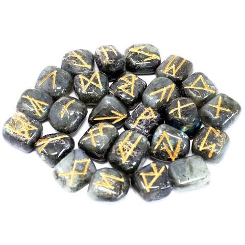 Unlock ancient symbols and personal insight with our Labradorite Rune Set, beautifully hand-carved and stored in a soft pouch for safekeeping. This set includes 25 polished stones—24 etched with traditional Elder Futhark runes and one left blank, also known as the Odin stone.

Labradorite is a mystical semi-precious stone known for enhancing intuition, spiritual awareness, and psychic abilities. With its shimmering play of colours, it serves as a powerful tool for divination, protection, and self-discovery.