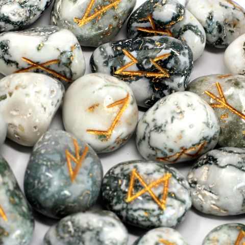 Shop Tree Agate Runes Set with 25 semi-precious stones in a pouch. Perfect for divination, meditation, and spiritual growth. Available now at The Witches Garden.