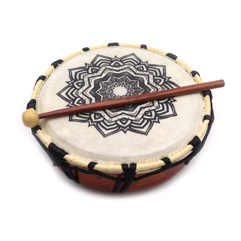 Immerse yourself in the sacred sounds of the 20cm Mandala Shamanic Drum, a compact yet powerful spiritual tool. Crafted with care from sustainable Suar wood and topped with authentic goat skin, this hand drum delivers deep, resonant tones perfect for shamanic journeying, meditation, or ritual work. The intricate Mandala design enhances the drum's energy, symbolising unity, balance, and inner harmony.

Whether you're a healer, sound therapist, or spiritual seeker, this drum is a beautiful addition to your sa
