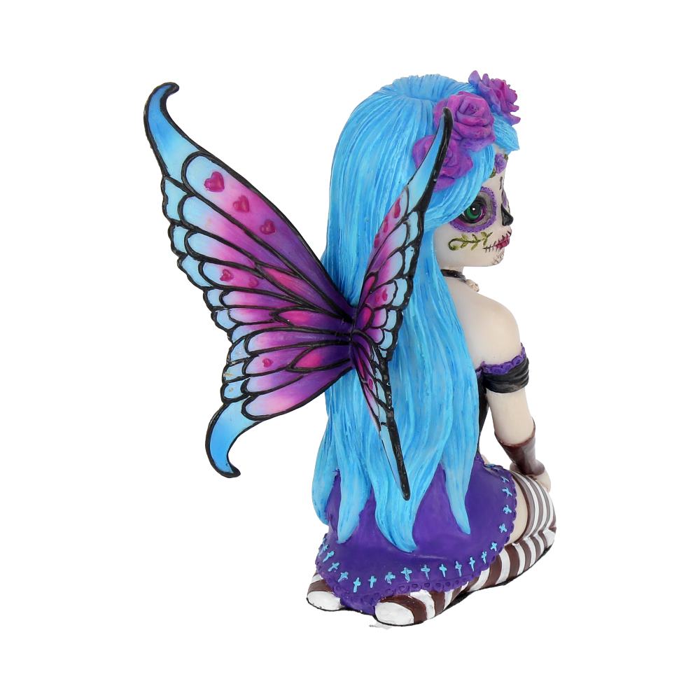 Colorful fairy doll with blue hair and butterfly wings on a white background