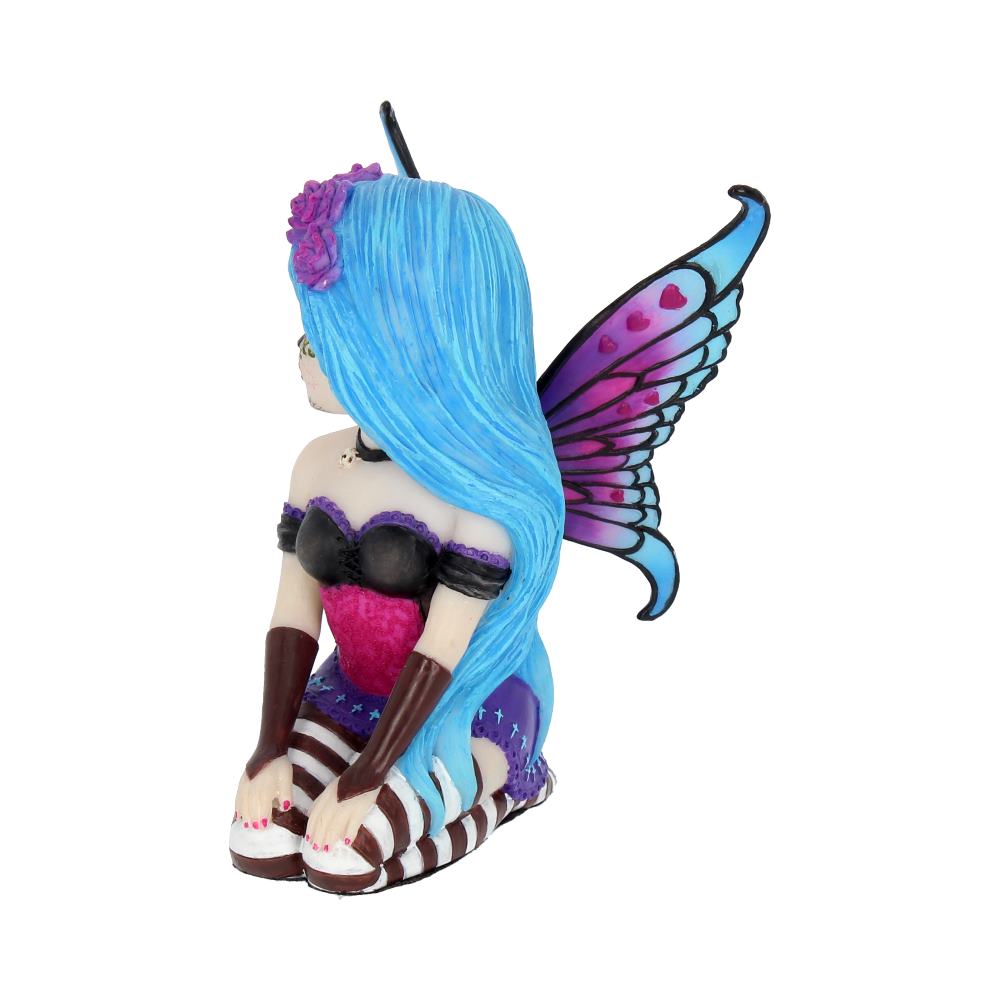 Fairy figurine with blue hair and wings on a white background