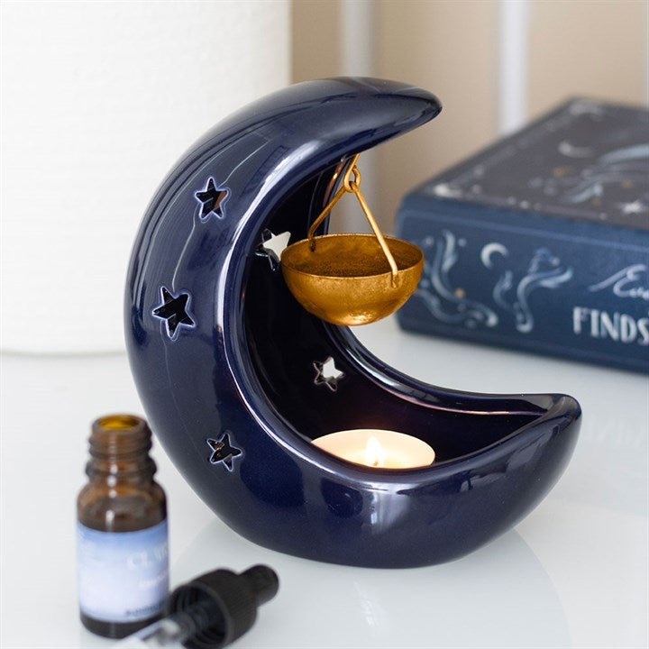 Blue Crescent Moon hanging oil burner with gold dish. Ideal for fragrance oils, altars, and creating a mystical, cosy home atmosphere all year long.