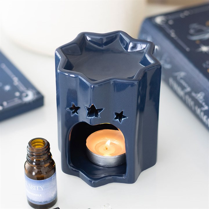 Blue Star oil burner for fragrance oils. Create a celestial, calming atmosphere in your home, meditation space, or altar with mystical star-shaped design.