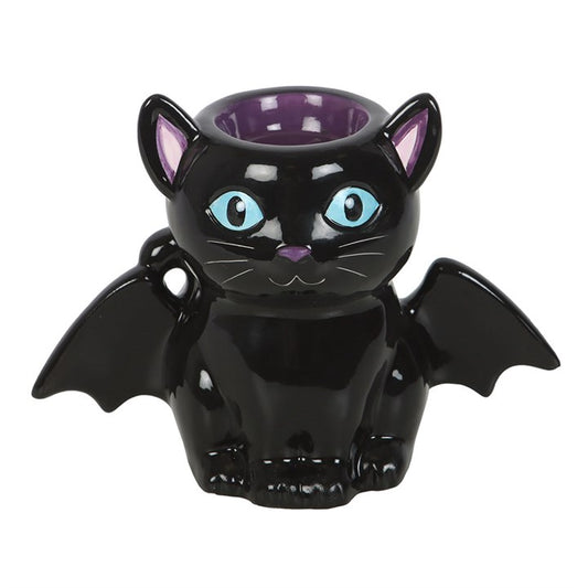 This bat-winged black cat oil burner and wax warmer is a magical addition to any gothic or mystical home. Crafted in a cute yet eerie design, the bat cat holds a bowl at the top, ready for your favorite wax melts or diluted fragrance oils. Simply place a tealight in the back, and let enchanting aromas drift through your space.

Perfect for gothic décor, witchy altars, or cozy evenings of mystical relaxation, this bat cat burner combines charm with a touch of the otherworldly.

Safety Note: Never leave a lit