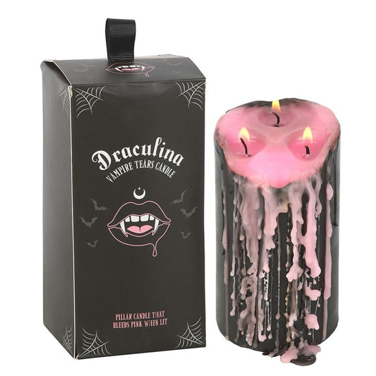 Add a pop of gothic glamour to your home with this large pink unscented pillar candle, which bleeds pink wax when lit for dramatic effect. A perfect décor piece for creating a moody vibe or as a unique gift.