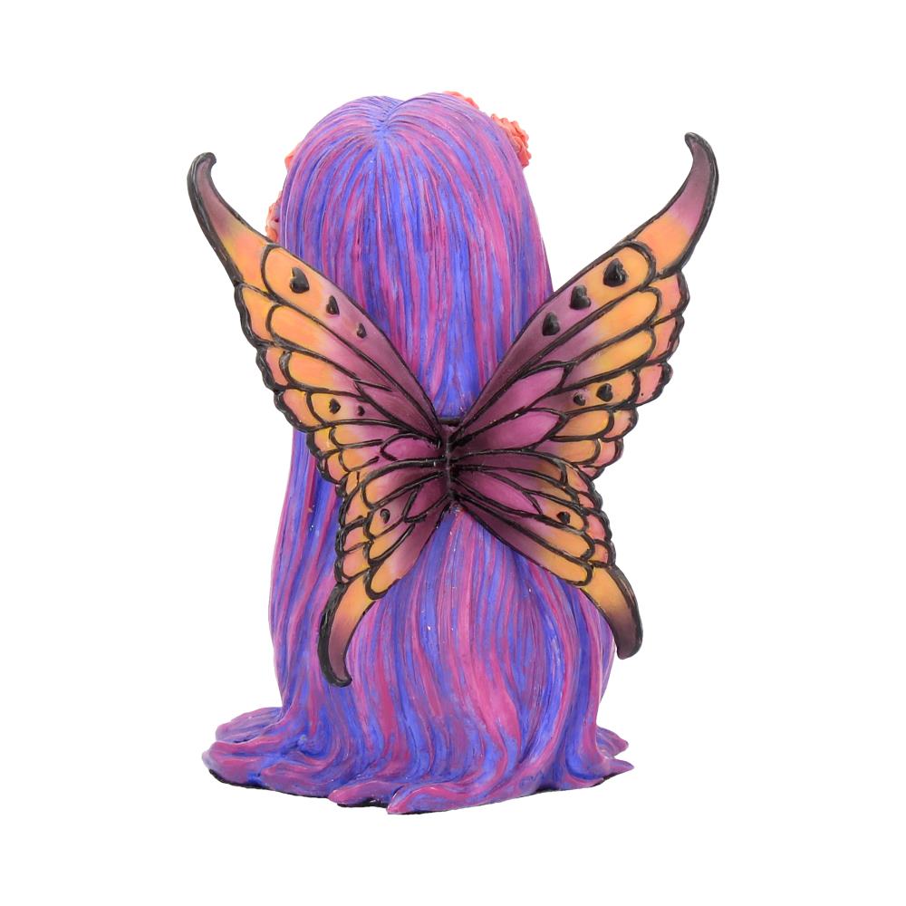 Colorful figurine with butterfly wings on a white background