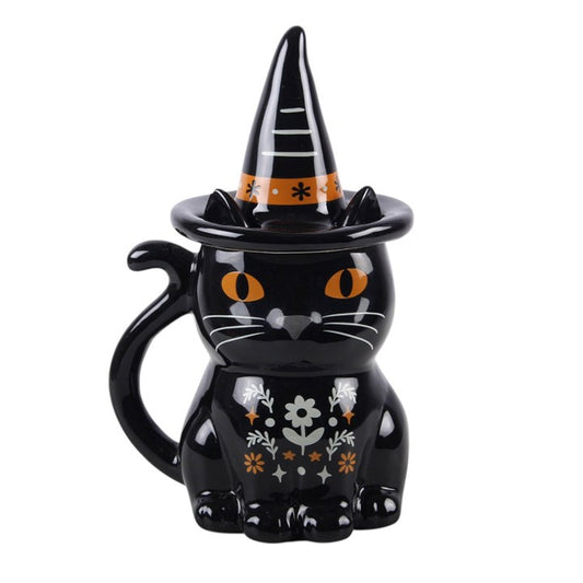 Enjoy a cosy drink in seasonal style with this black cat lidded mug, featuring a folk-inspired design and a witch’s hat lid for a fun and practical finish. Perfect for autumn days at home, it makes a thoughtful gift for anyone who loves themed kitchenware and characterful designs. Ideal for tea, coffee, or hot chocolate. Do not microwave. Hand wash only.