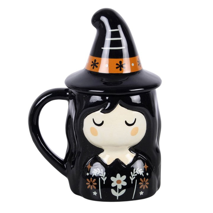 Enjoy a cosy drink in seasonal style with this witch lidded mug, featuring a folk-inspired design and a pointed hat lid that adds a fun and practical detail. Perfect for autumn days at home, it makes a thoughtful gift for anyone who loves themed kitchenware and characterful designs. Ideal for tea, coffee, or hot chocolate. Do not microwave. Hand wash only.