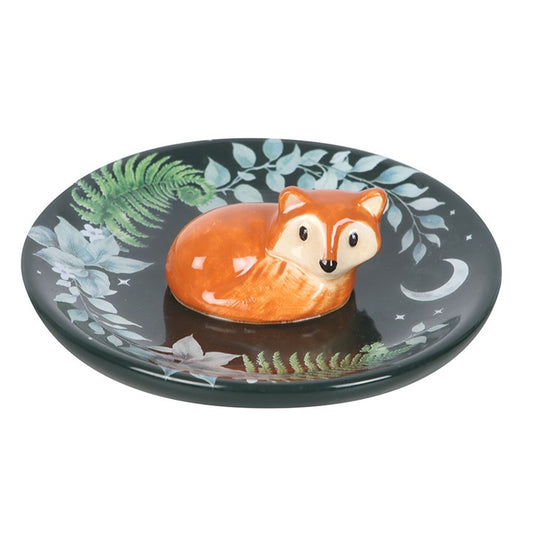 Discover the enchanting Green Fox Trinket Dish, a ceramic treasure designed to cradle your jewellery and precious keepsakes with care. Adorned with a serene fox nestled among mystical woodland foliage, this dish brings a touch of forest magic to your sacred space. Perfect as a thoughtful gift for birthdays, Christmas, or for anyone drawn to charming, nature-inspired home accessories. Let this trinket dish be a guardian of your small treasures, inviting a whisper of woodland mystery and protection into your 