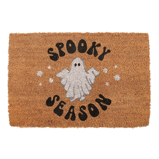 Embrace the enchanting aura of autumn with our Natural Spooky Season Ghost Doormat, crafted from natural coir to welcome your guests with a touch of mystical charm. This whimsical mat showcases a groovy floating ghost, inviting playful spirits to your doorstep during Halloween and the crisp fall season. Its natural fibers offer durability while adding an earthy texture to your entryway. Please note, the design may gently fade under harsh weather conditions, so it is best suited for sheltered or indoor space