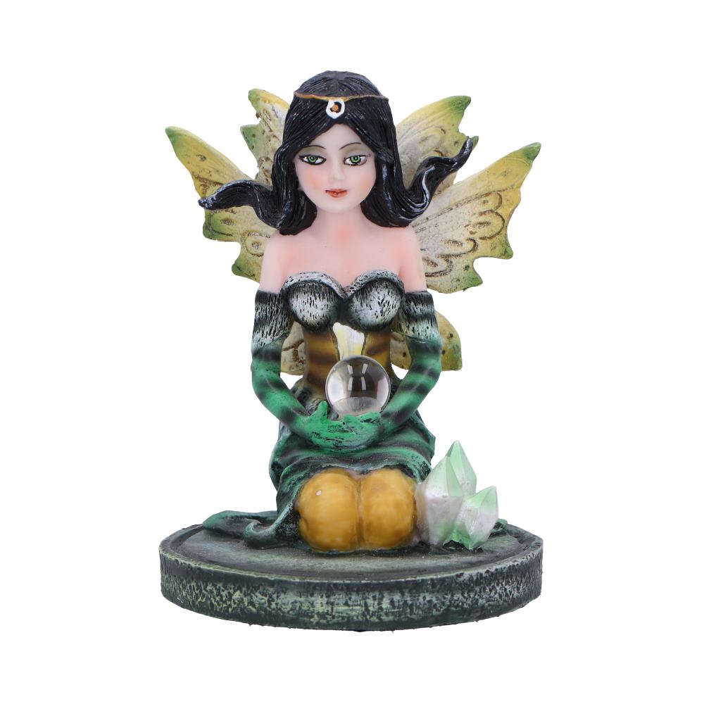 Standing gracefully at approximately 9cm tall, Jade mesmerizes with her serene pose, delicately holding a glass ball on her knee, while adorned in vibrant green and yellow striped clothing. The base of the figure is adorned with shimmering crystals, adding an extra touch of magic to this enchanting piece. She’s a perfect addition to any fairy collection.