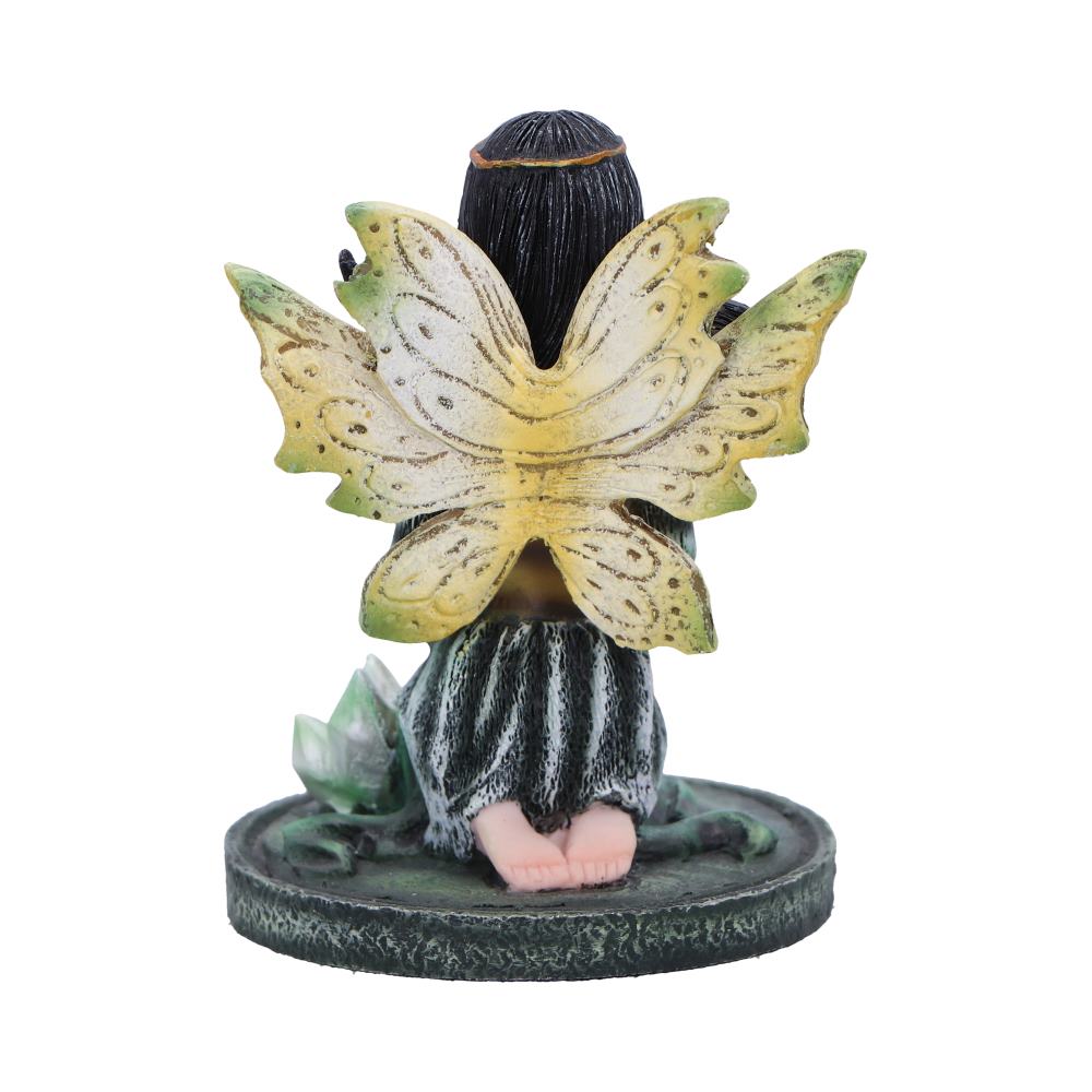 Fairy figurine with butterfly wings on a white background
