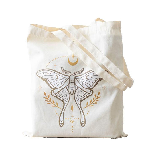 This durable polycotton canvas tote bag is ideal for carrying everything from groceries to daily essentials. Featuring an elegant luna moth design, it combines practicality with an ethereal sense of style.