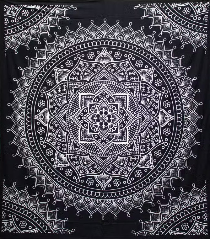 Bring timeless elegance and spiritual symbolism into your home with this beautiful Black &amp; White Lotus Flower Cotton Bedspread and Wall Hanging. Featuring a stunning lotus flower design inspired by ancient Indian traditions, this striking piece of textile art combines intricate patterns with a classic monochrome colour scheme.