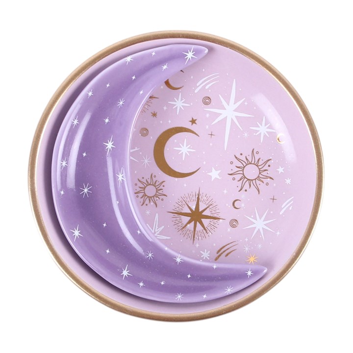A round ceramic dish with a celestial design, featuring a lavender purple crescent moon and starry sky pattern with a gold rim, set against a plain white background.