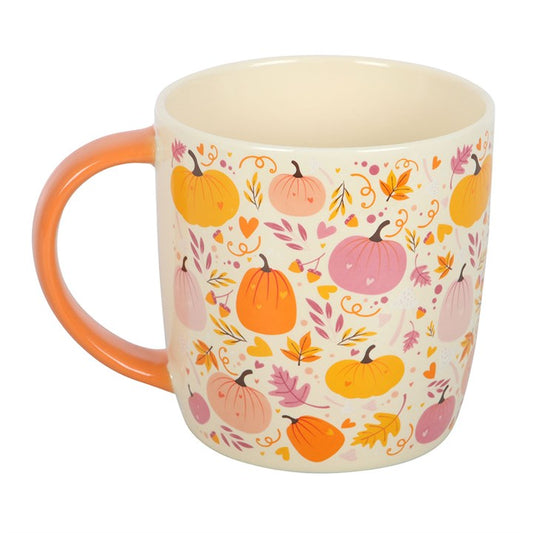 Brighten up tea breaks with this cheerful ceramic mug featuring a playful pink and orange pumpkin print, perfect for adding a seasonal touch to everyday drinks. A lovely gift for autumn enthusiasts or anyone who enjoys fun and colourful kitchenware. Microwave and dishwasher safe.