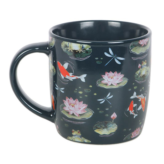 Add a splash of whimsy to your morning with this charming mug. Featuring an all-over print of lily pads, frogs, dragonflies, lily flowers and koi fish, it will bring a touch of nature's beauty to everyday moments. 350ml capacity. Dishwasher and microwave safe.